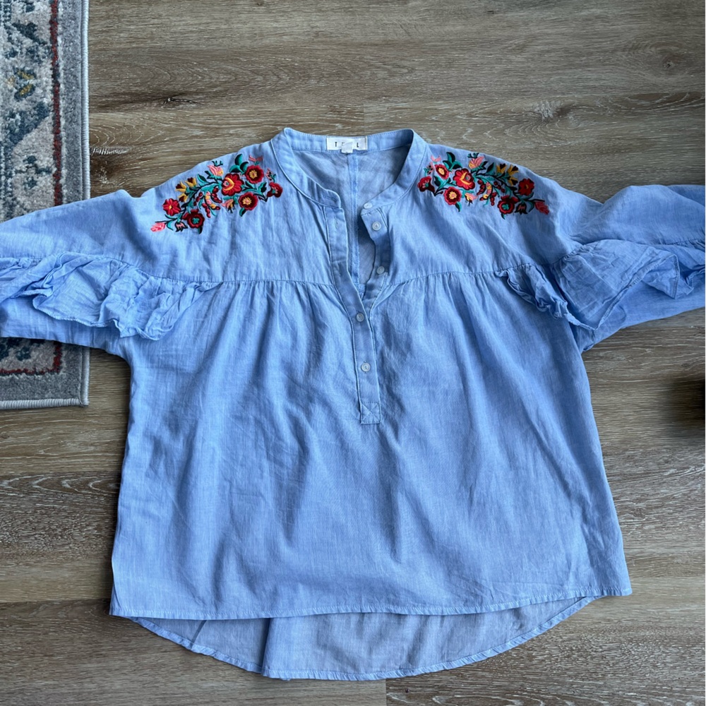 Stunning pale blue cotton blouse